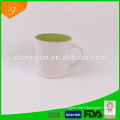 ceramic white mug with colour inside